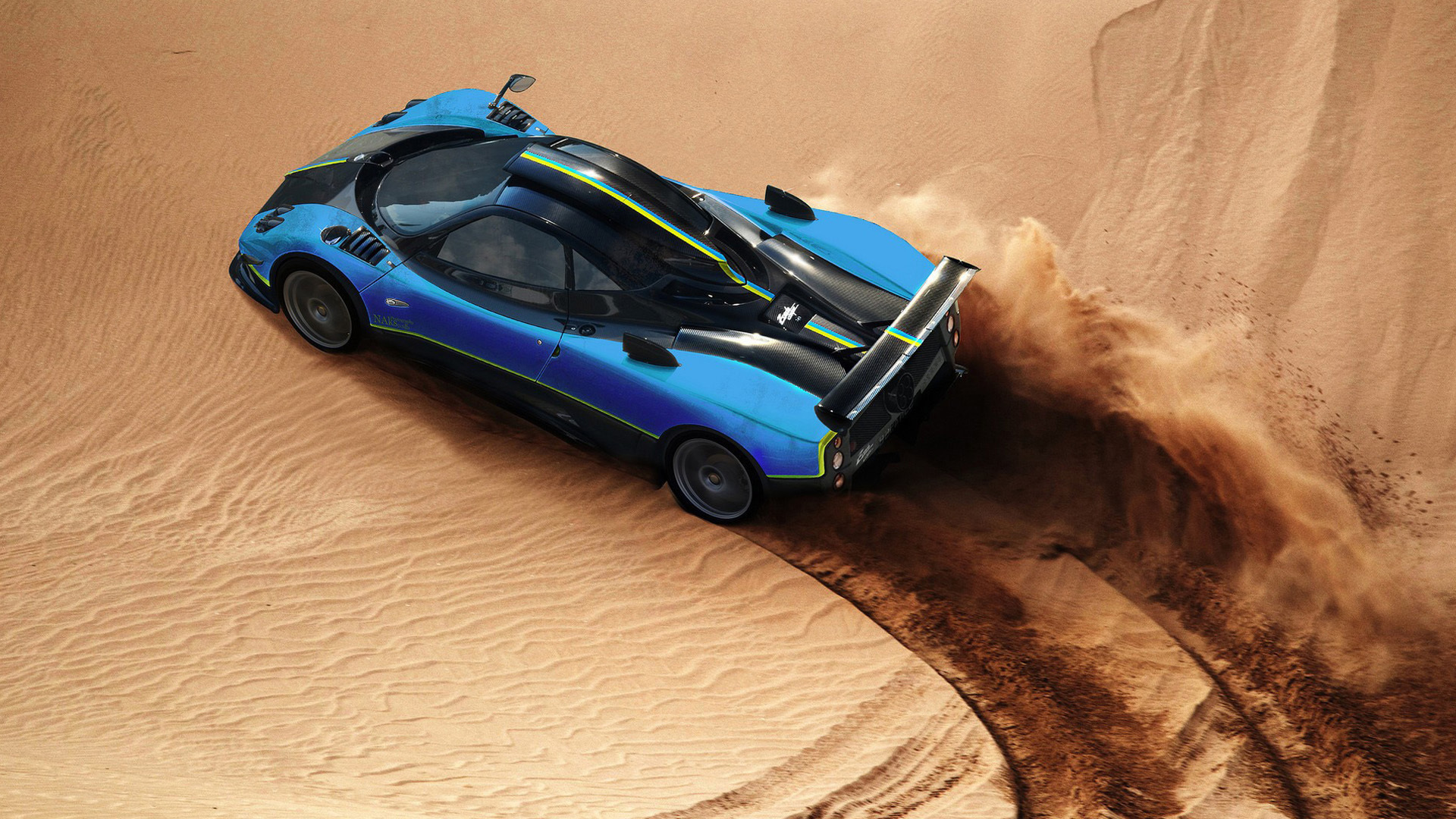 沙丘中的蓝色跑车